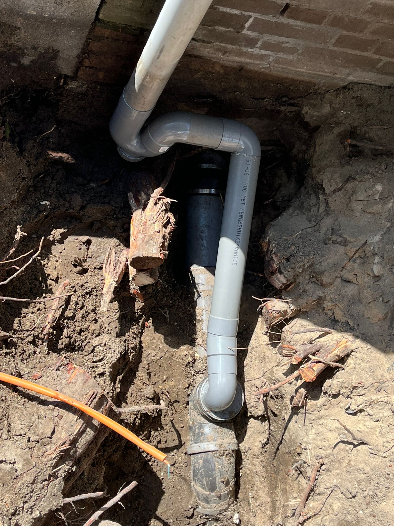 a man working on a toilet